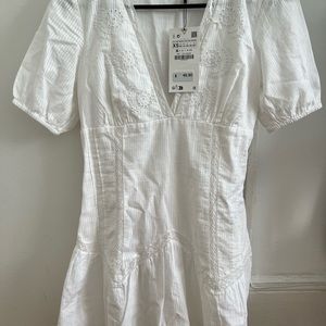 Short dress with open embroidery